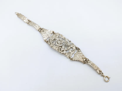 Zilveren schakelarmband met bloemmotieven, 17 cm