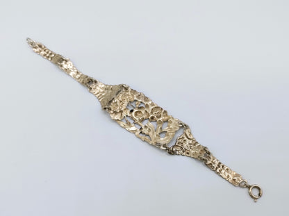 Zilveren schakelarmband met bloemmotieven, 17 cm