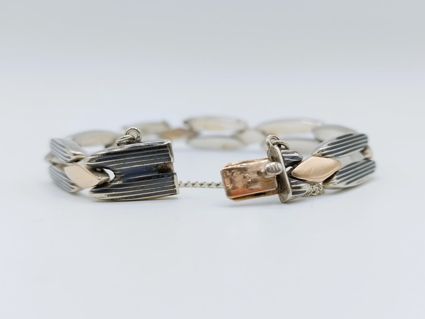 Zilveren design schakelarmband met goudvergulde schakels, 19,5 cm