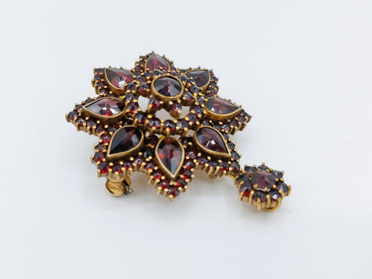 Verguld zilveren broche bezet met granaten