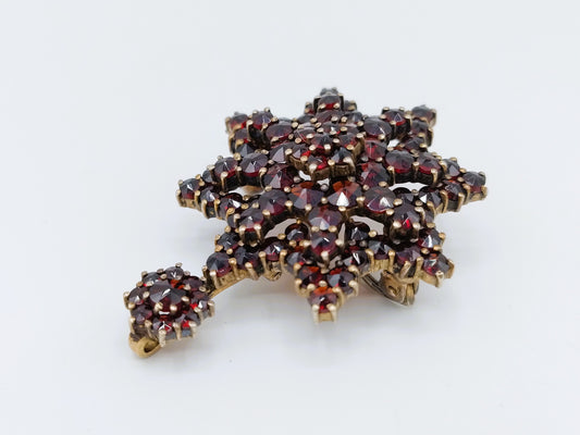 Verguld zilveren broche bezet met granaten