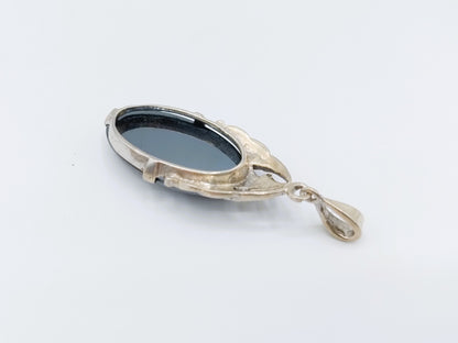 Zilveren art deco hanger bezet met hematiet en markasieten