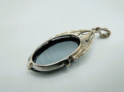 Zilveren art deco hanger bezet met hematiet en markasieten