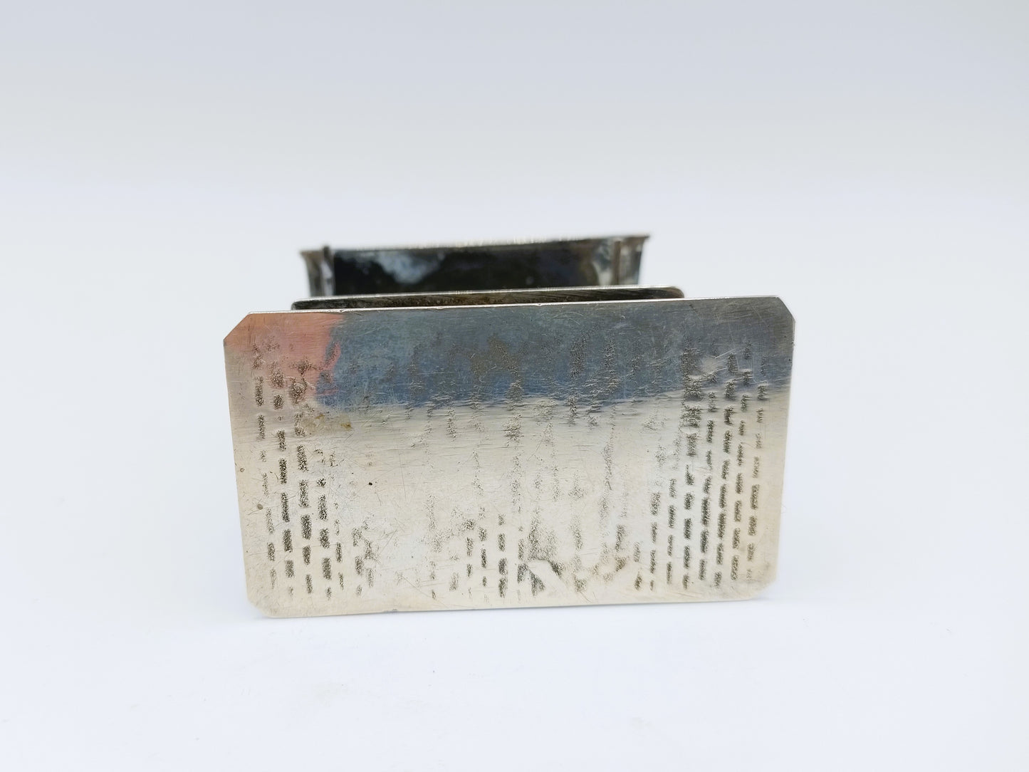 Silver miniature fabric seller