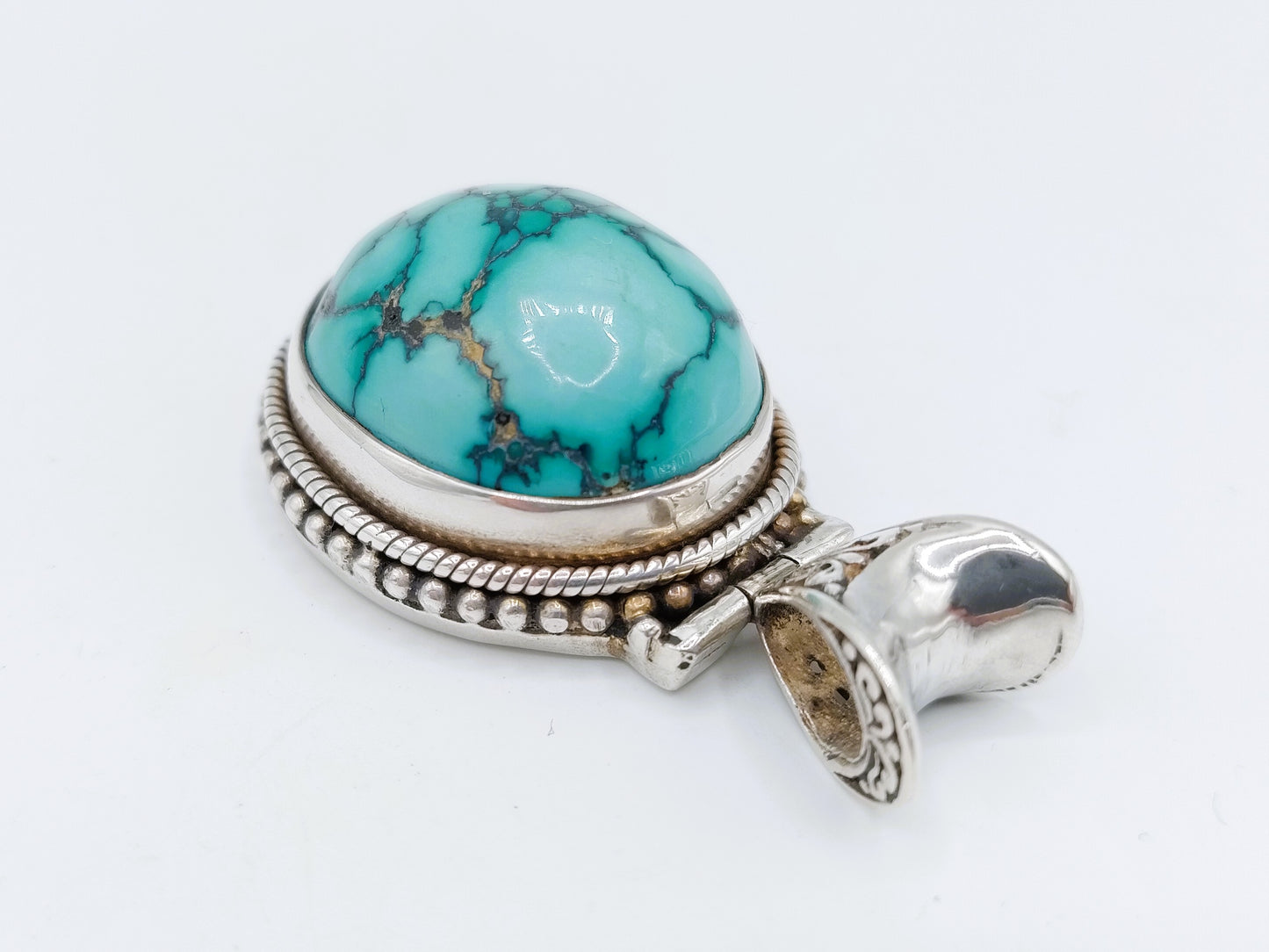 Robuuste zilveren hanger met een grote turkoois