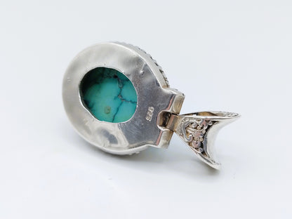 Robuuste zilveren hanger met een grote turkoois