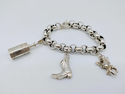 Robuuste armband met jasseron schakel en 3 bedels, 21,5 cm