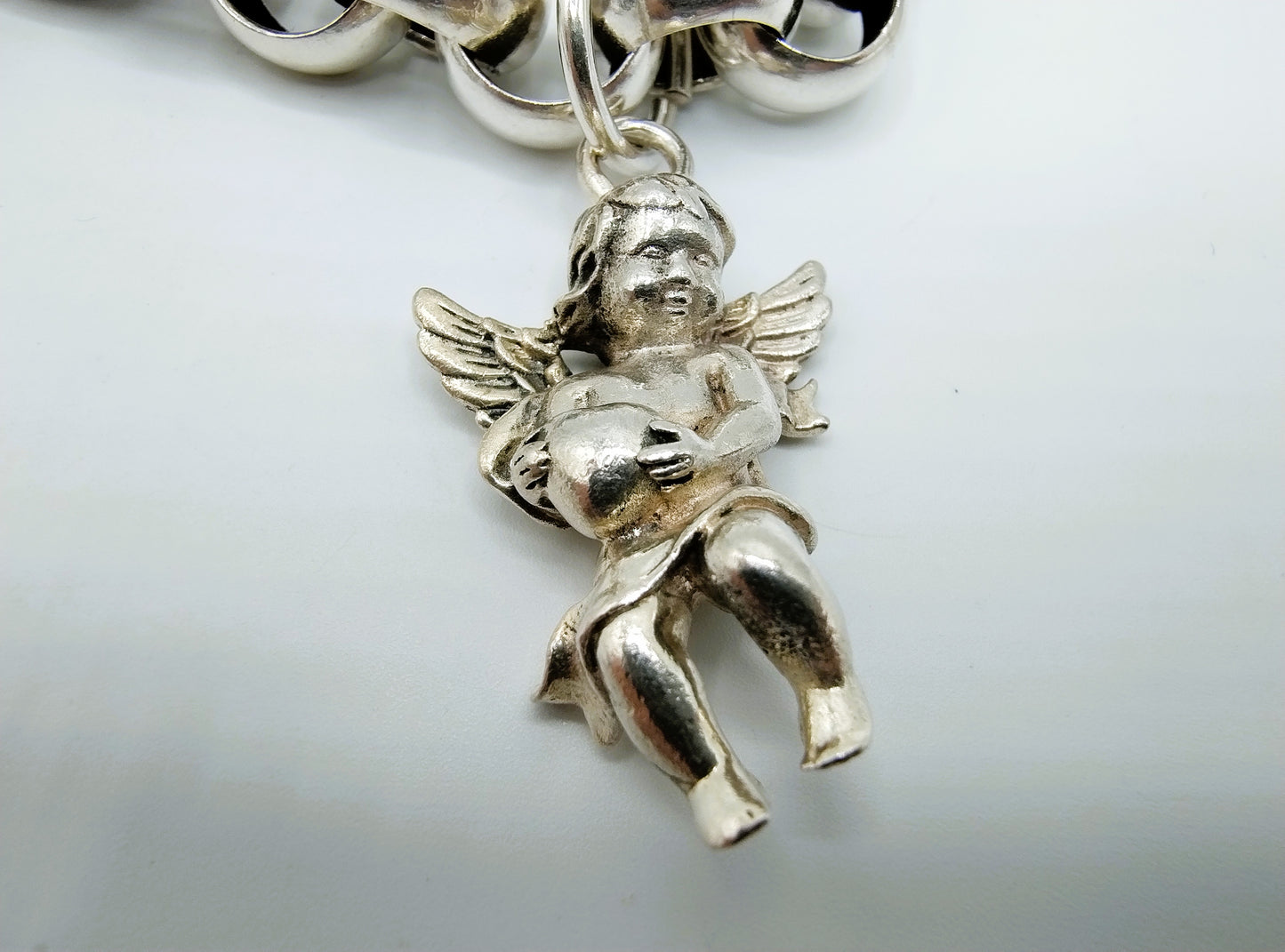 Robuuste armband met jasseron schakel en 3 bedels, 21,5 cm