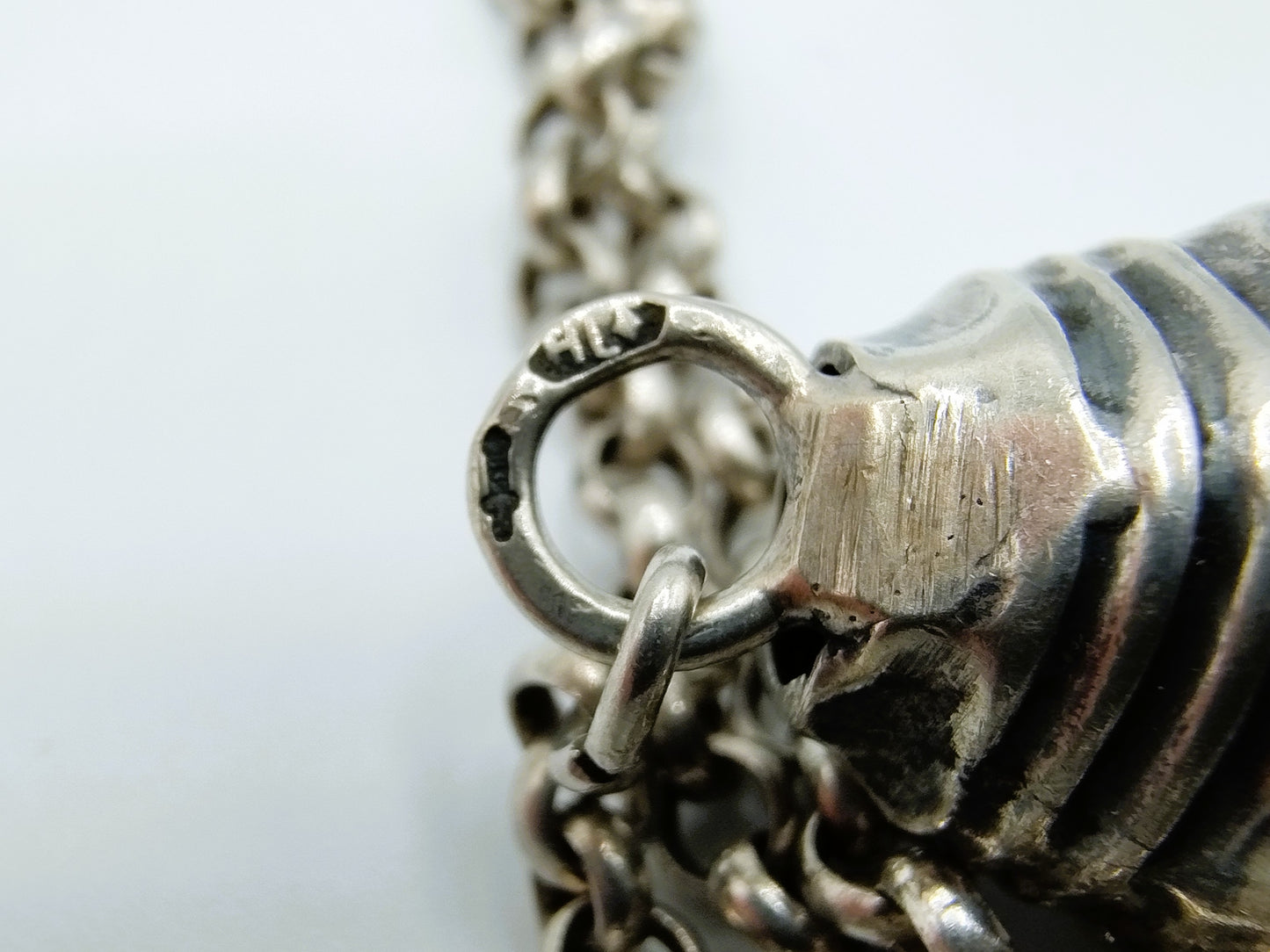 Zilveren jasseronketting met breipendoppen, H. Looren - de Jong, Schoonhoven