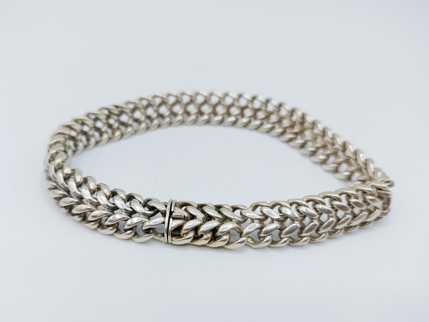 Zilveren heren schakelarmband, 24 cm.