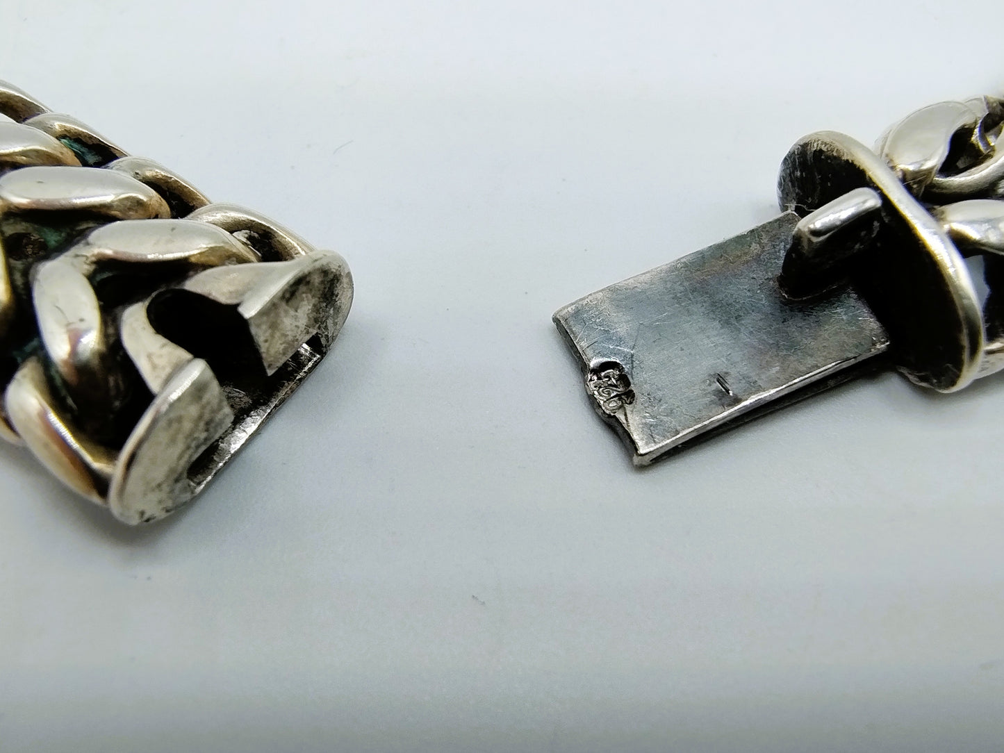 Zilveren heren schakelarmband, 24 cm.