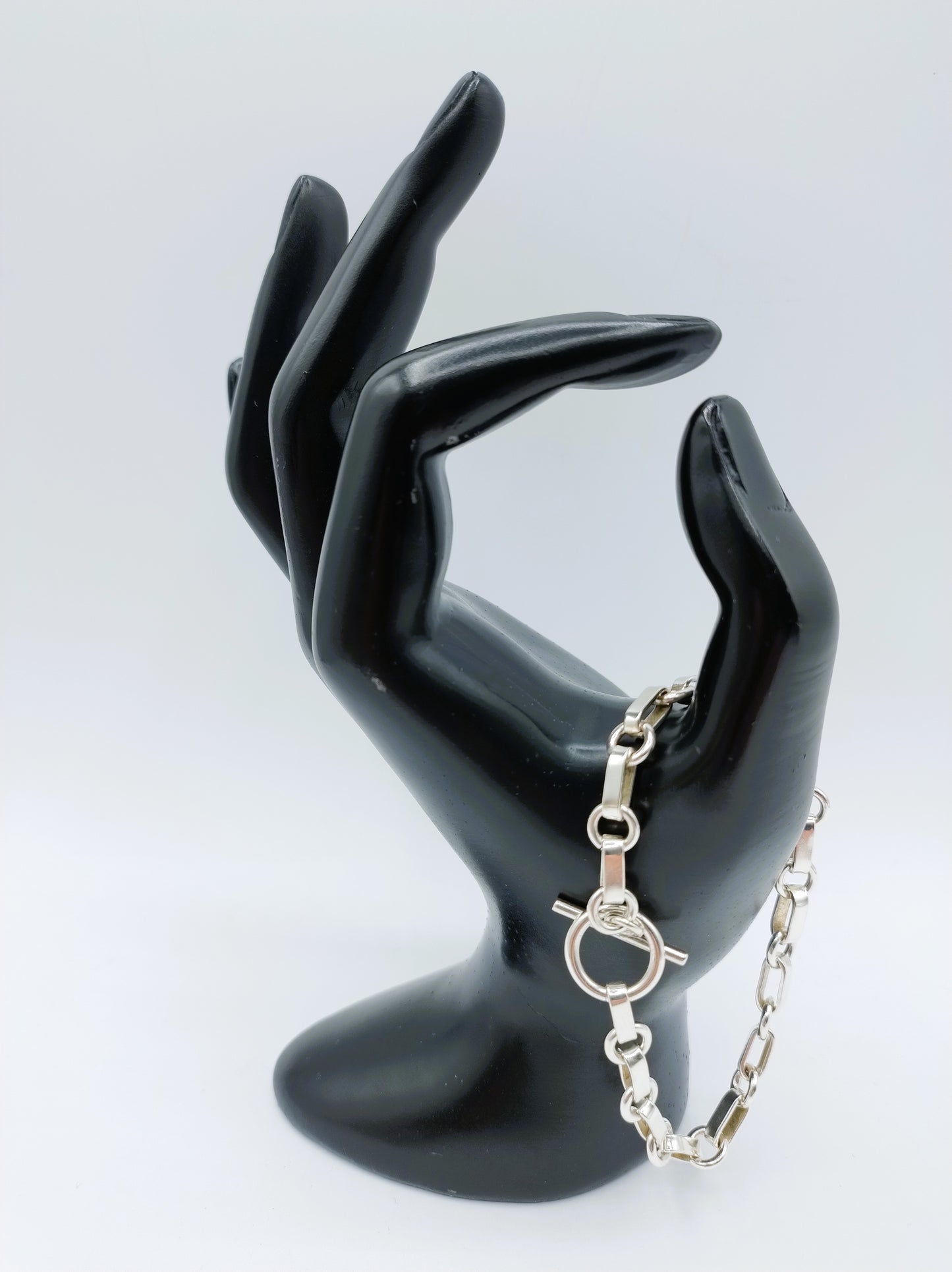 Zilveren schakelarmband met kapittelsluiting, 19 cm.