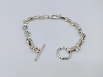 Zilveren schakelarmband met kapittelsluiting, 19 cm.