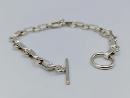 Zilveren schakelarmband met kapittelsluiting, 19 cm.