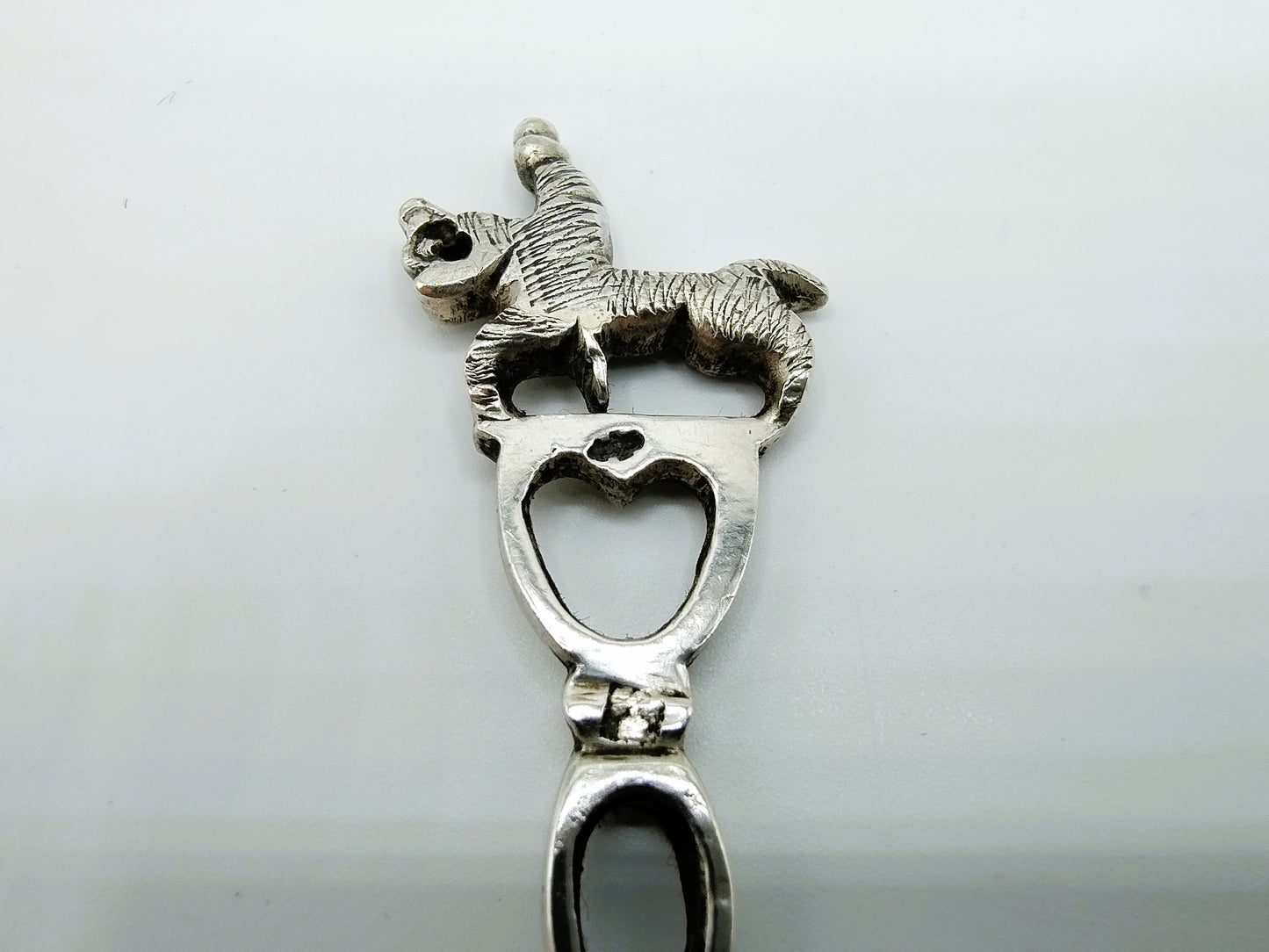 Zilveren pijpenwroeter met ruiter te paard, 19e eeuws