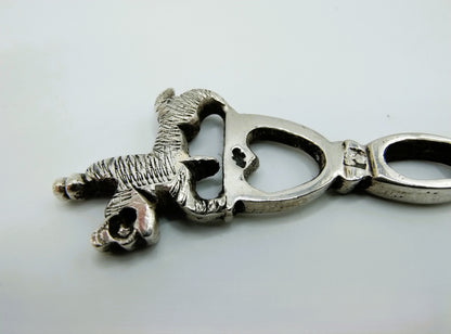 Zilveren pijpenwroeter met ruiter te paard, 19e eeuws