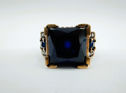 Zilveren heren ring  met saffier en zirkonia, 18 mm, brons