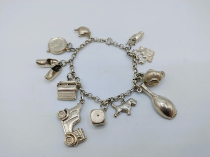 Silbernes Bettelarmband mit 9 Charms, 19,5 cm, 835