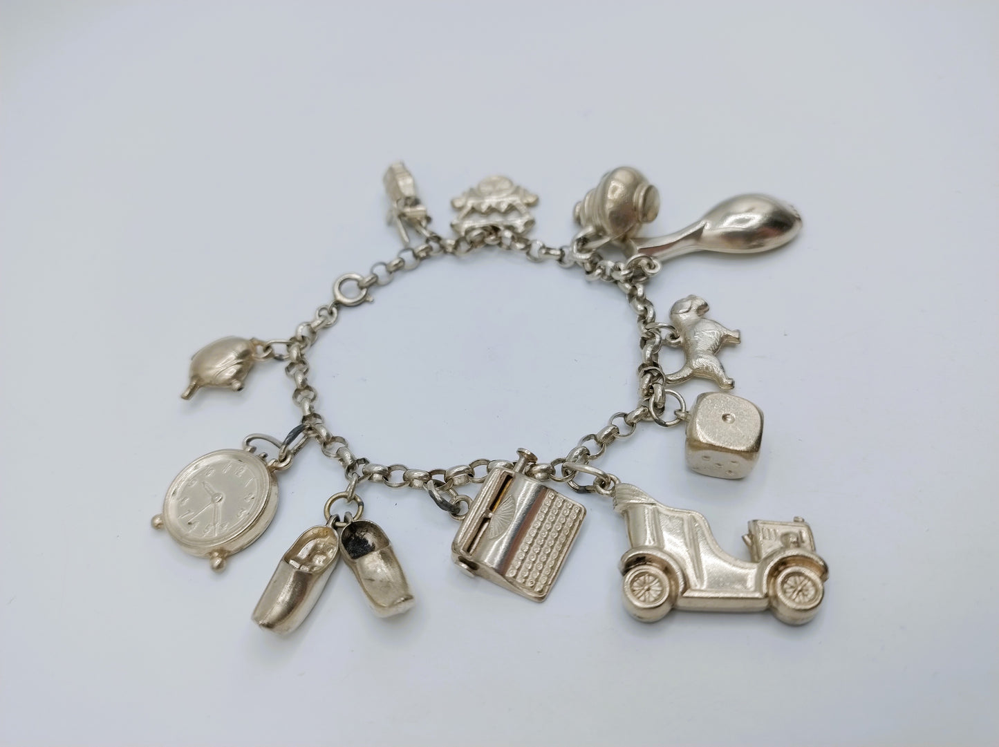 Silbernes Bettelarmband mit 9 Charms, 19,5 cm, 835