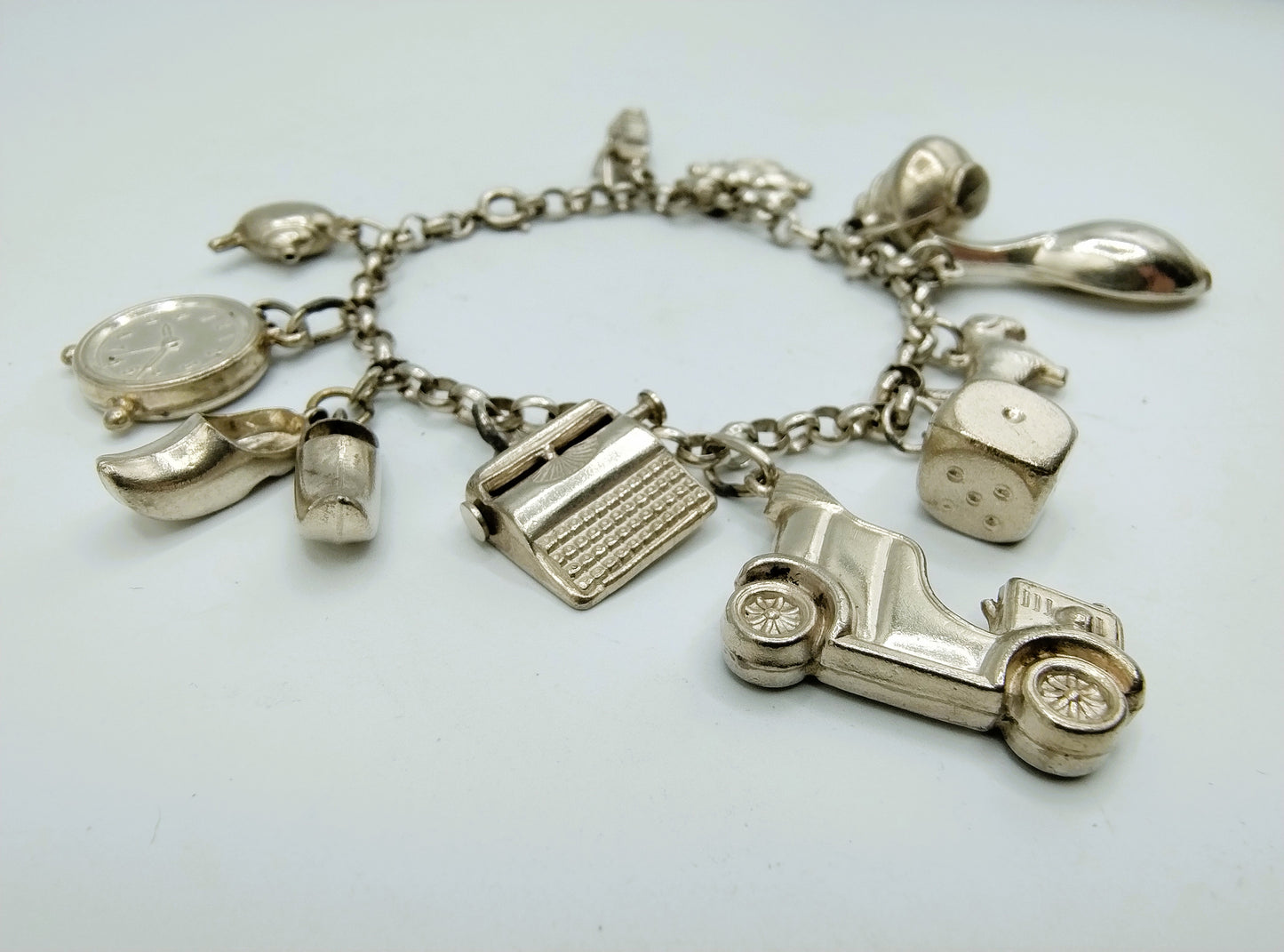 Silbernes Bettelarmband mit 9 Charms, 19,5 cm, 835