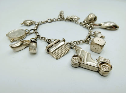 Silbernes Bettelarmband mit 9 Charms, 19,5 cm, 835