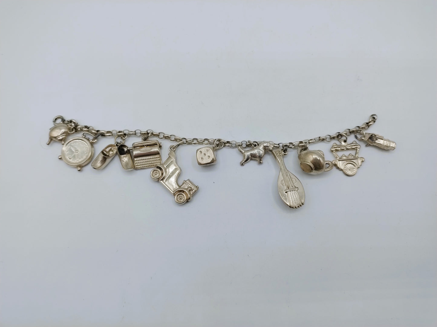 Silbernes Bettelarmband mit 9 Charms, 19,5 cm, 835