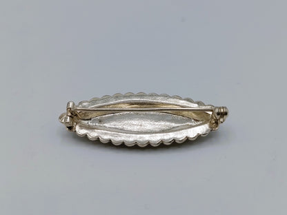 Silberne Brosche, Tracht