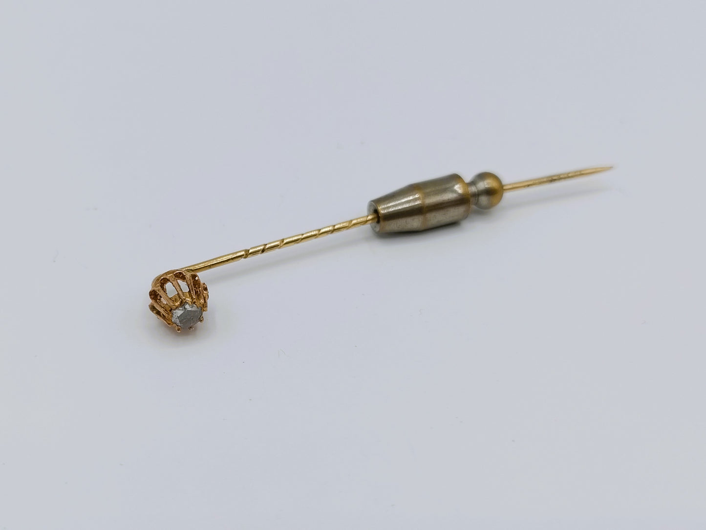 Gold tie or lapel pin with rose diamond