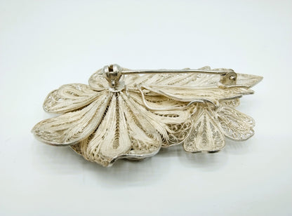 Silver filigree brooch, 835