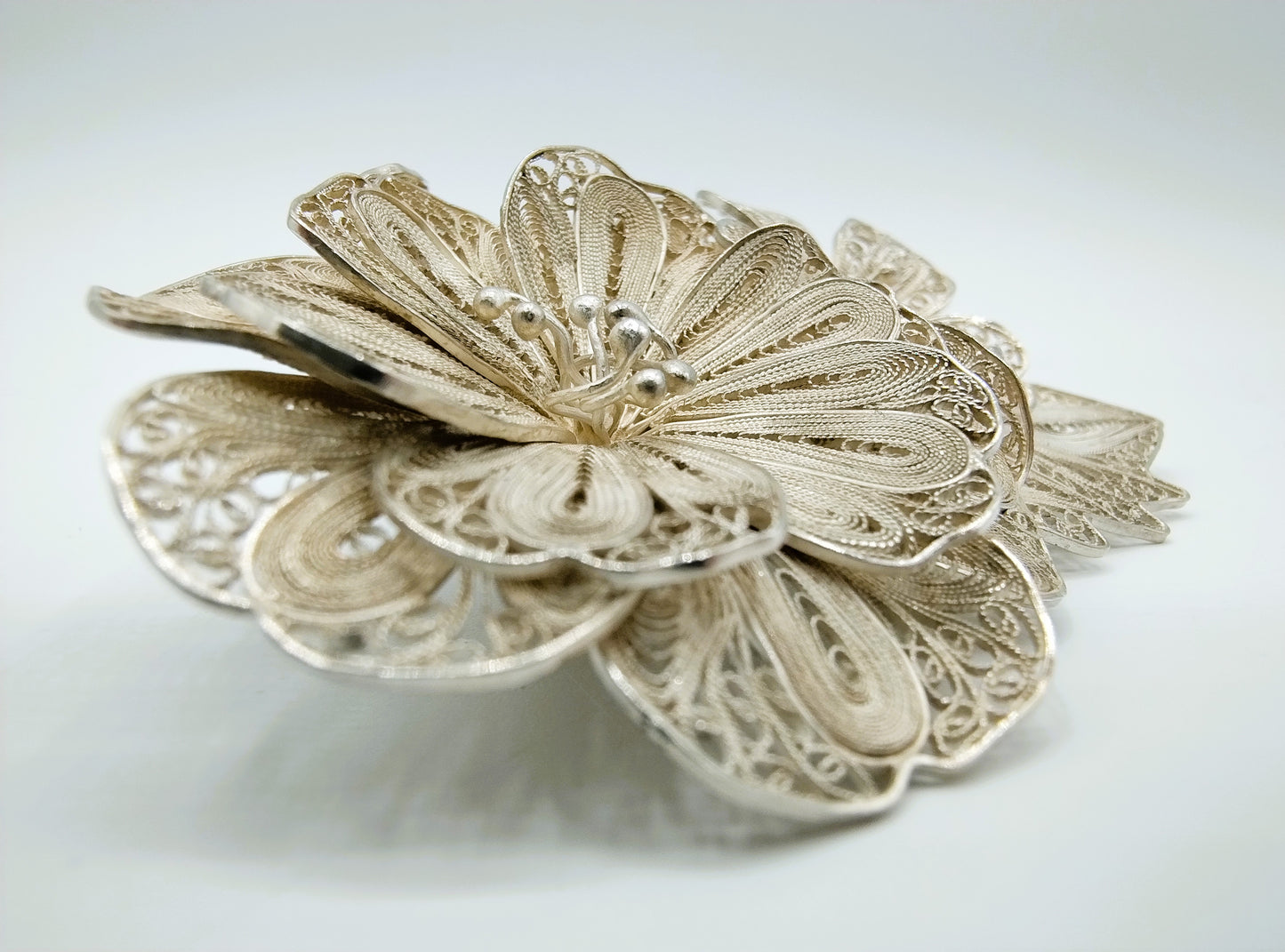 Silver filigree brooch, 835