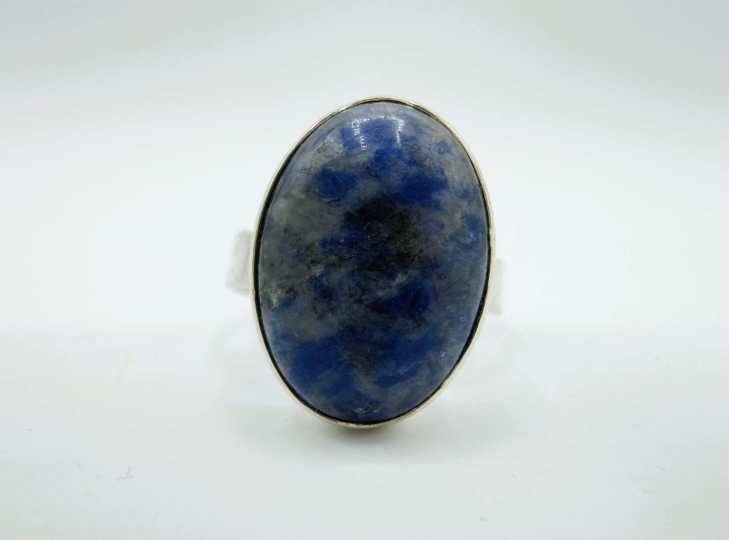 Zilveren ring met blauwe kleursteen, universele maat