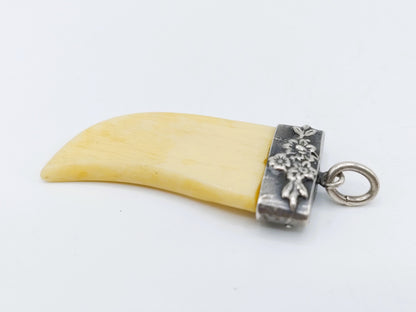 Decorative pendant in silver frame