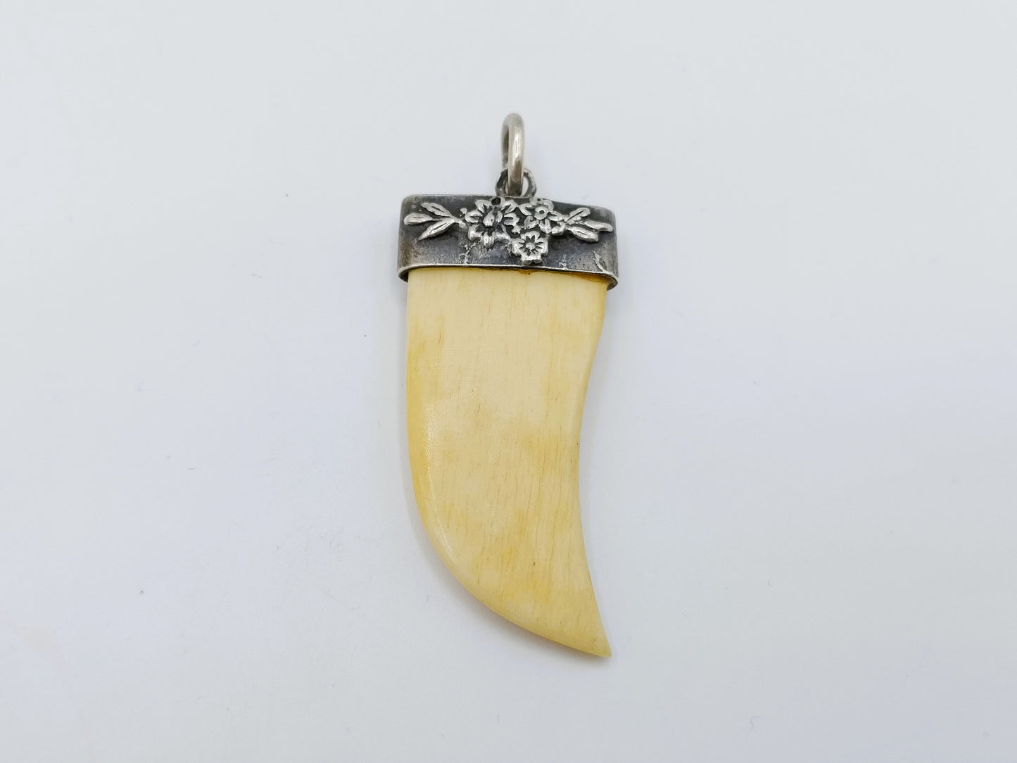 Decorative pendant in silver frame