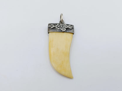 Decorative pendant in silver frame