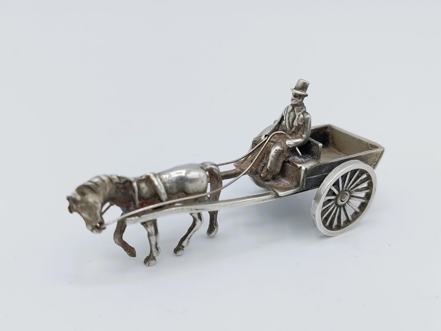 Zilveren miniatuur paard en wagen