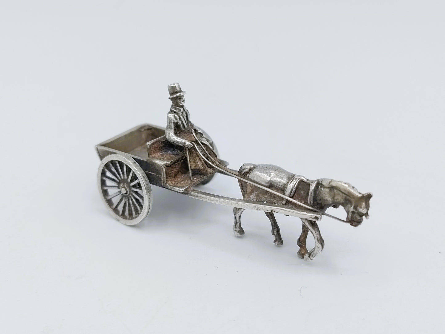 Zilveren miniatuur paard en wagen