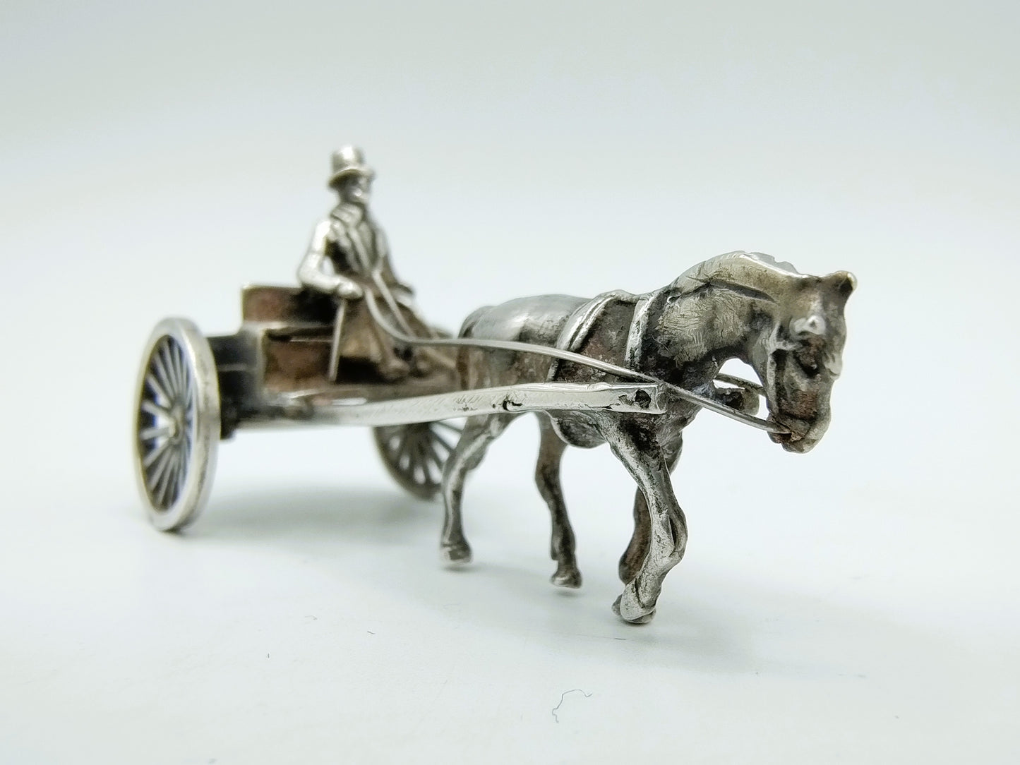 Zilveren miniatuur paard en wagen