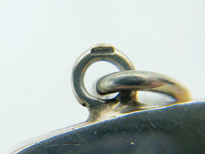 Silver medallion pendant, 835