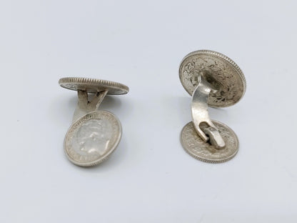 Zilveren manchetknopen gemaakt van 10 en 25 cent, Wilhelmina