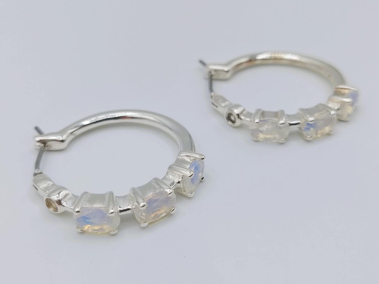 Silver hoop earrings with moonstone