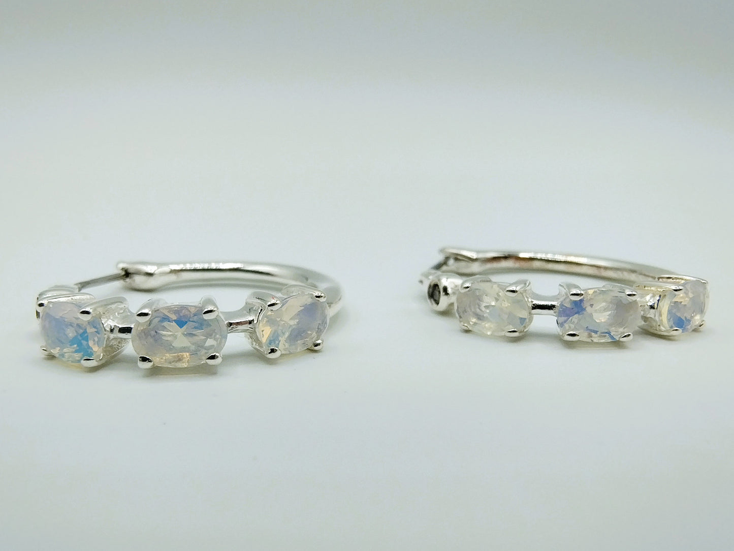 Silver hoop earrings with moonstone