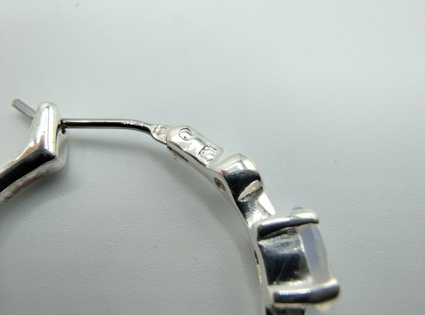 Silver hoop earrings with moonstone