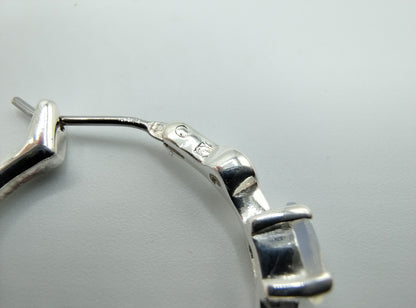 Silver hoop earrings with moonstone
