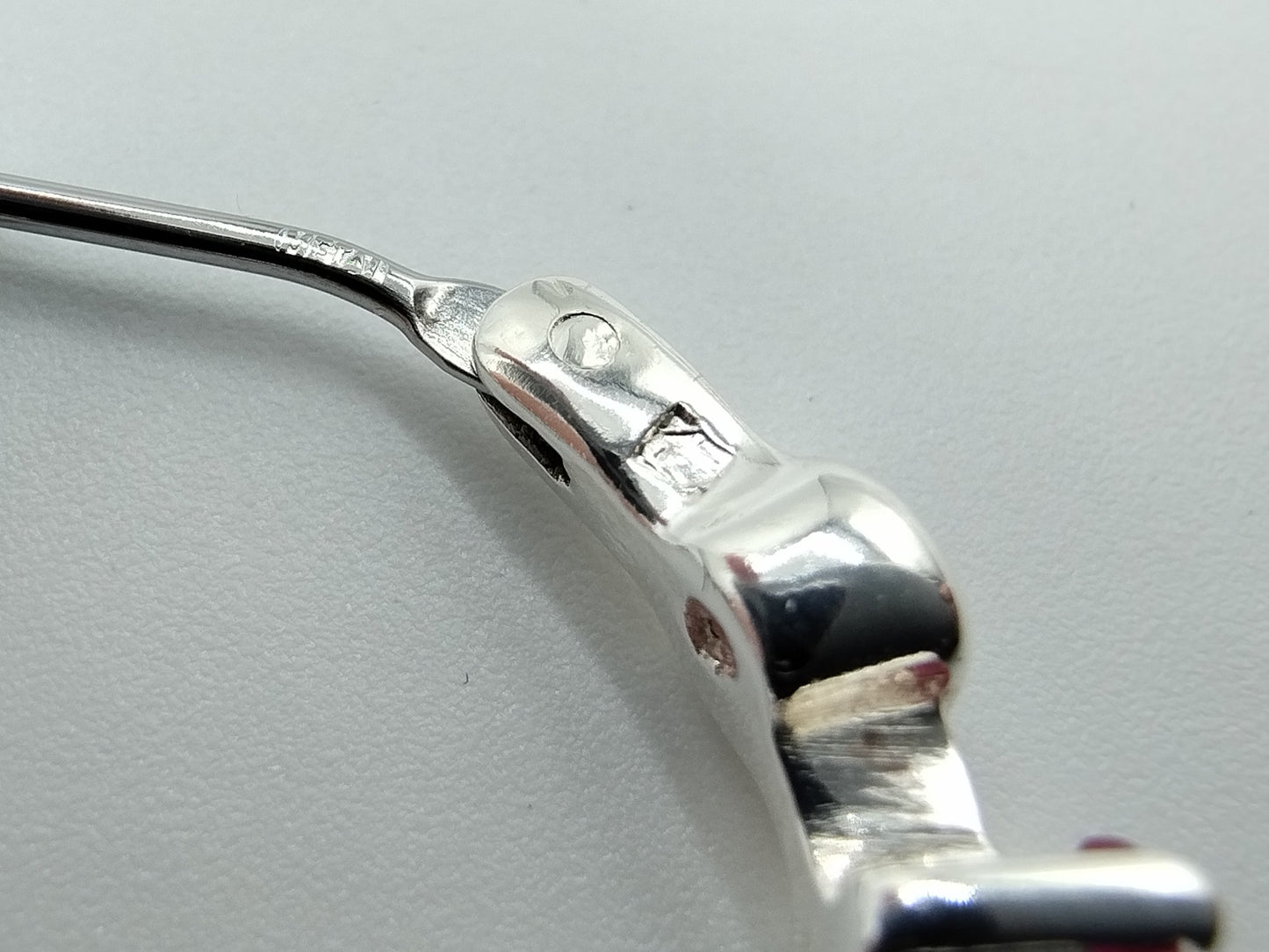 Silver hoop earrings with purple stones