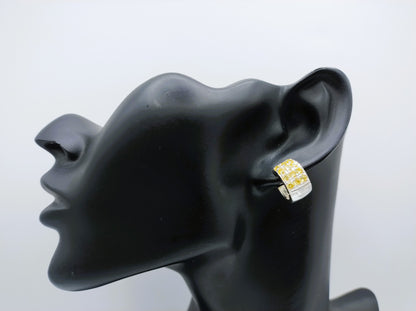 Silver hoop earrings with yellow stones