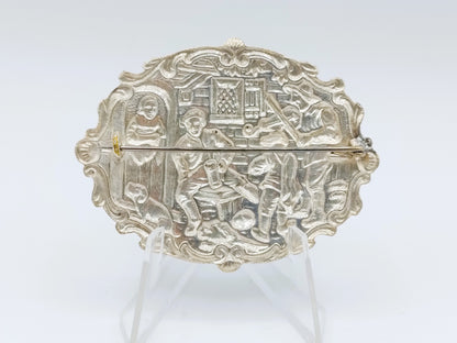 Silver brooch with old Dutch decor