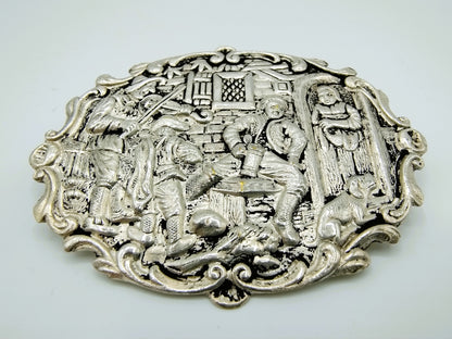 Silver brooch with old Dutch decor