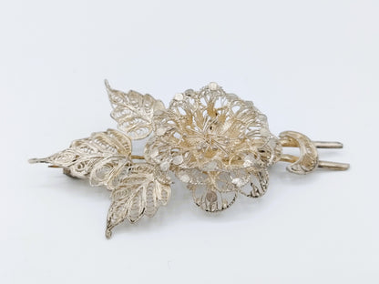 Silver filigree brooch, 835