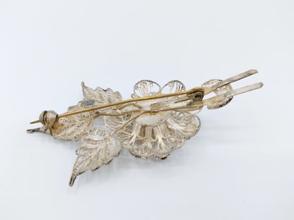 Silver filigree brooch, 835