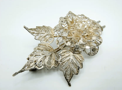 Silver filigree brooch, 835